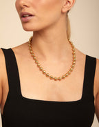 Bead necklace with contrasting accents